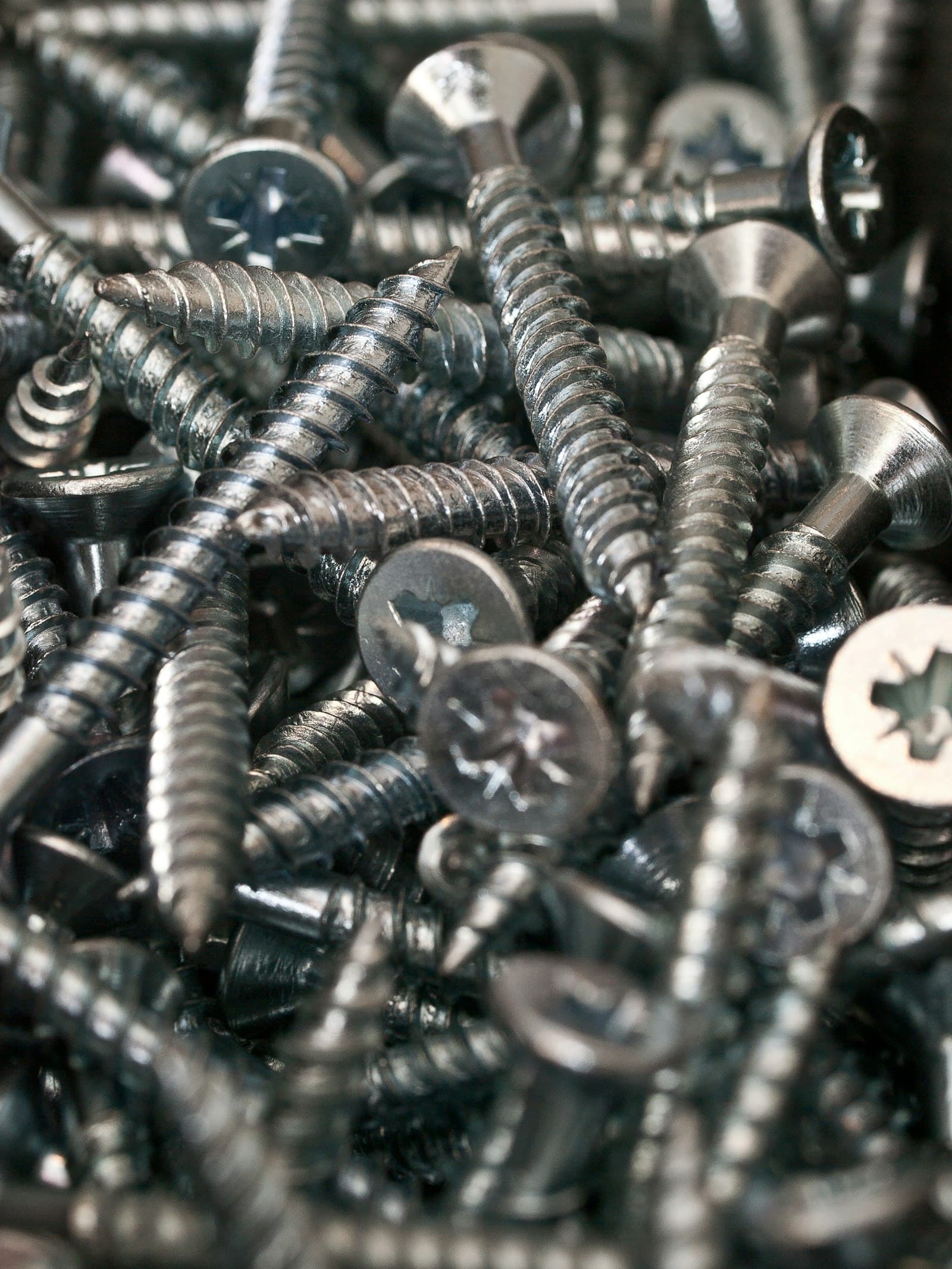 A pile of machine screws and nuts