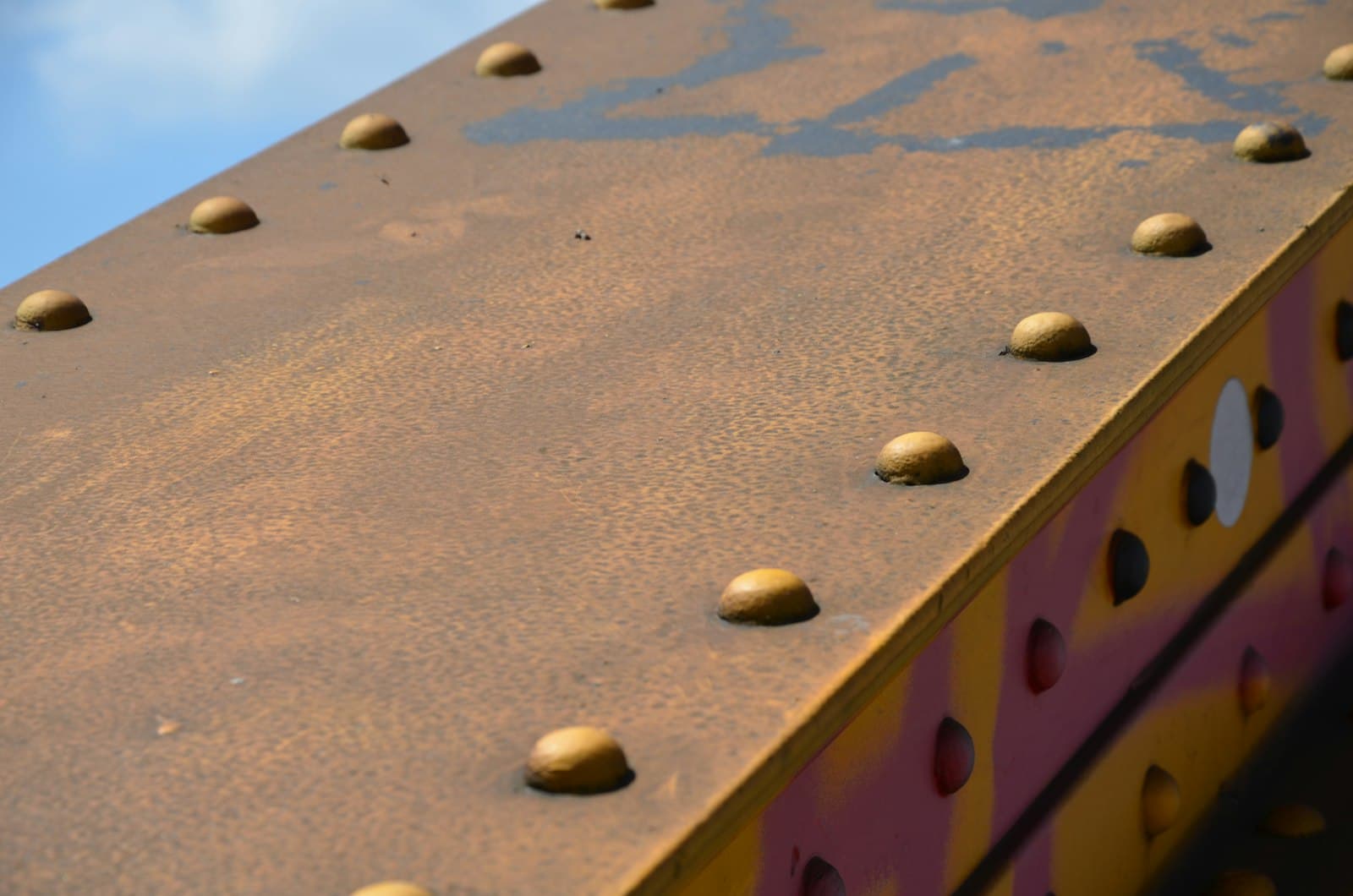 Close-up of a metal structure fastened with anchors